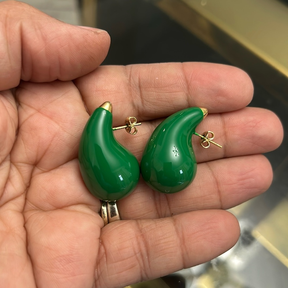 Green and gold earrings.